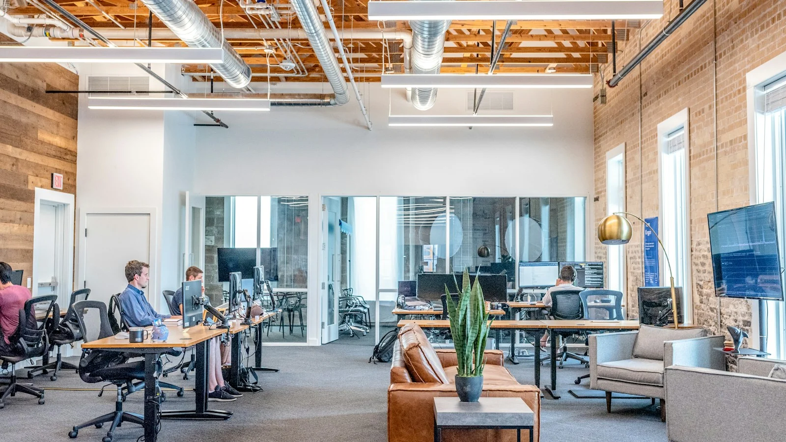 A professional business executive leading an AI strategy meeting in a modern Sydney boardroom.